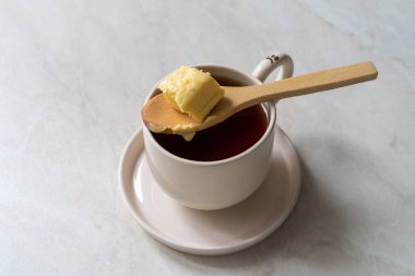 Bulletproof coffee, blended with organic butter and MCT coconut oil, paleo, keto, ketogenic drink breakfast. ready to serve.