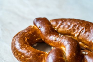 Pretzel on Marble Surface. Close Up Macro View.Pretzel on Marble Surface. Close Up Macro View. Traditional Food.