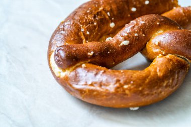 Pretzel on Marble Surface. Close Up Macro View.Pretzel on Marble Surface. Close Up Macro View. Traditional Food.