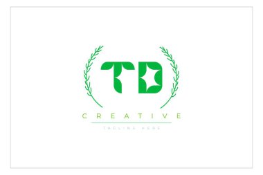 TD letters eco logo with leaf. Fresh nature and healthy leaf logo design. clipart