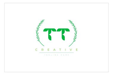 TT Green Minimalist Logo Tasarımı Doğal Yapraklar ve Metin Elementleri. Taze doğa ve sağlıklı yaprak logosu tasarımı.