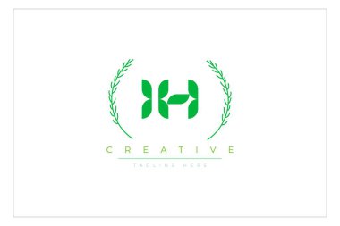 IH Green Minimalist Logo Tasarımı Doğal Yapraklar ve Metin Elementleri. Taze doğa ve sağlıklı yaprak logosu tasarımı.