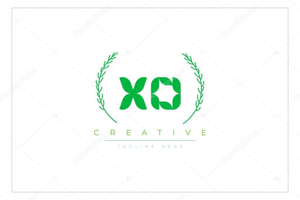 XO Green Minimalist Logo Design Featuring Natural Leaves and Text Elements. Fresh nature and healthy leaf logo design.