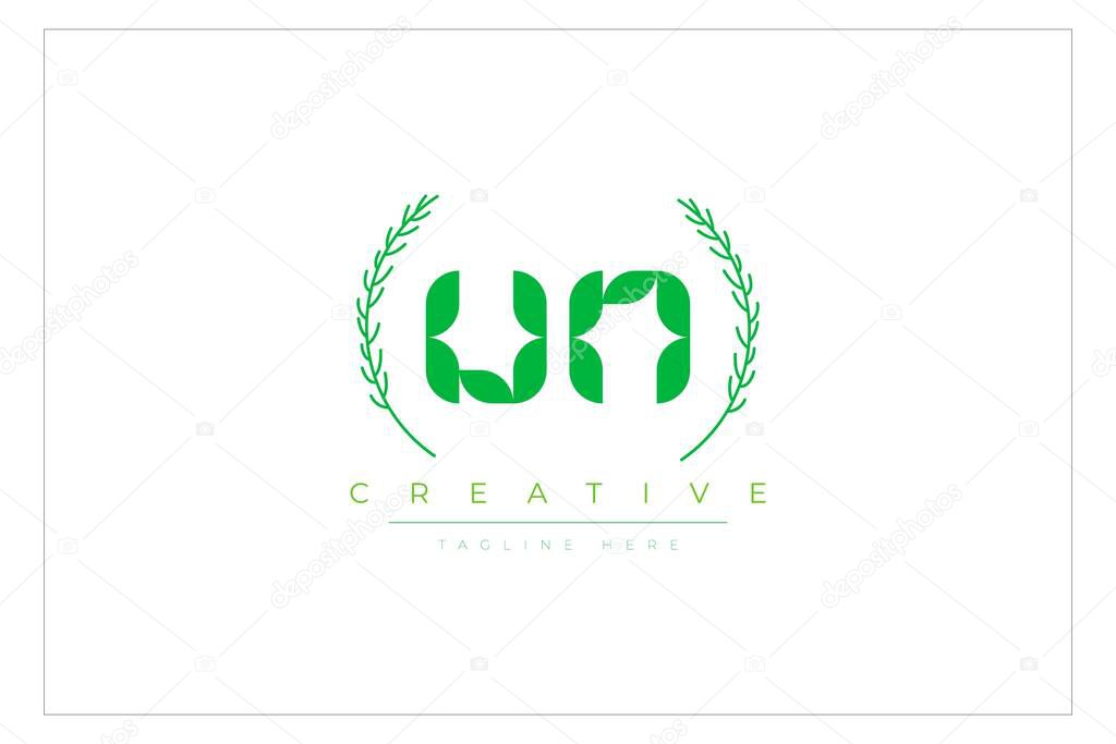 UN Green Minimalist Logo Design Featuring Natural Leaves and Text Elements. Fresh nature and healthy leaf logo design.