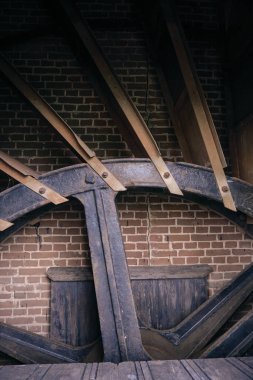 Close-up of the inside scoop wheel in the Loenderveense polder mill, a historic drainage windmill, with showcasing Dutch water management heritage. clipart