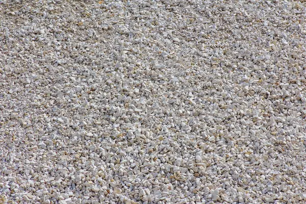 Yoğun çakıl toplamı dokusu, yapı ve malzeme uygulamaları için detaylı taş parçaları örüntüsü gösteriyor