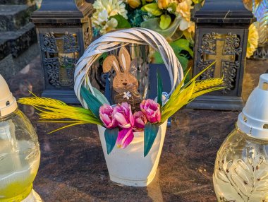 Warsaw, Poland, June 16, 2025 Memorial photograph with yellow ribbons and flowers creates personalized tribute display honoring individual memory