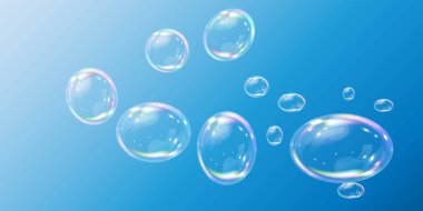 Tasarım yapmak için çok renkli sabun köpükleri. Tatil çizimleri. Ayrı, şeffaf, gerçekçi sabun köpükleri açık mavi arka planda.