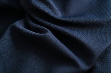 Koyu mavi kumaş dokusu kapatma ayrıntısı 