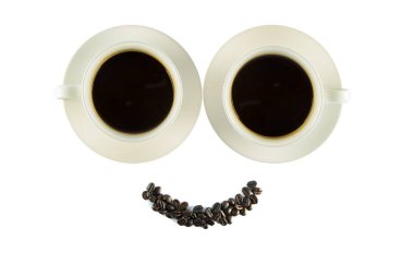 Smile shaped coffee beans isolated on white background clipart