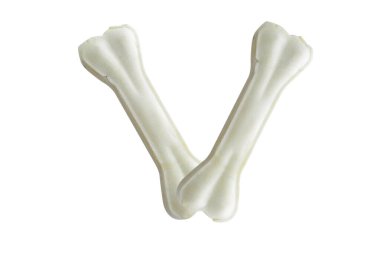 Alfabe biçiminde köpek kemiği.