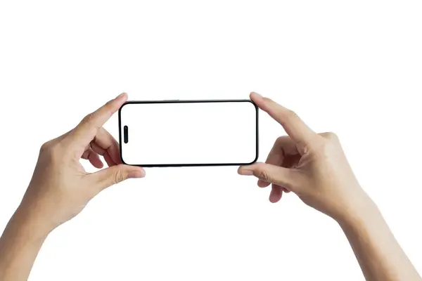 Beyaz ekranlı bir telefon tutan bir kişi var. Merak ve keşif kavramı, çünkü kişi muhtemelen bir resim çekiyor ya da telefonda bir şeyler kaydediyor.