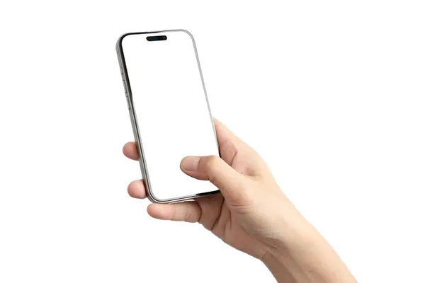 Beyaz arka planı olan bir cep telefonunu tutan bir el. Telefon gümüş renkli.