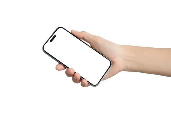Beyaz cep telefonunu tutan bir el. Telefon açık değil ve ekranı da yok. El, telefonun neredeyse tamamen görülebileceği bir şekilde konumlandırılmış.
