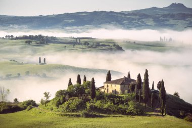 Misty Tuscan Landscape with Farmhouse, Italy clipart