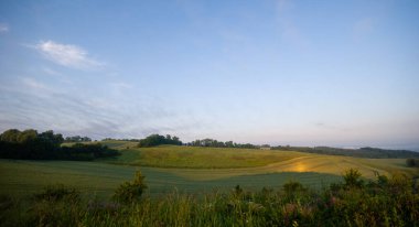 Rural Landscape in Poland with Rolling Hills and Fields clipart