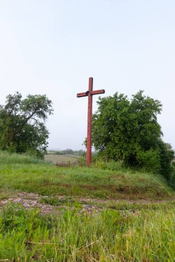 Wooden Cross in Rural Poland Landscape. Cedynia Poland clipart