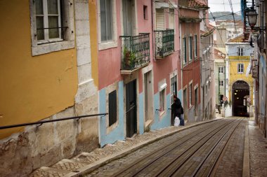 Hilly Street with Tram Tracks in Lisbon - Elevador da Bica clipart