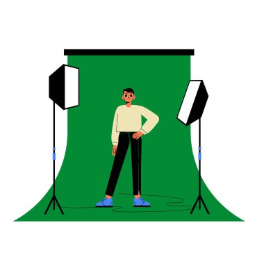 Bir fotoğraf stüdyosunda profesyonel ışıklandırma ile yeşil ekran setinde poz veren erkek model. Sahne, moda çekimleri, modellik ve stüdyo fotoğrafçılığını sembolize eder..