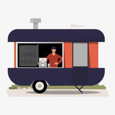 Bir erkek satıcı kahve servisi yapan bir yemek kamyonunda duruyor, bir şehir ortamında sokak yemeği kültürünü ve kentsel kolaylığı temsil ediyor..