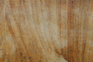 Sarının farklı tonlarına sahip soyut kaba doku. Çizgili ve noktalı desenli doğal bir taş. Tasarımlarınıza kolayca derinlik ve organik doku ekleyin.