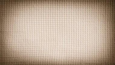 Kumaş bej ve koyu kahverengiyle uyumlu bir arkaplan. Grunge vintage tasarımları sade ve sakinleştirici bir tasarım sunar. Boş alan onu kişiselleştirilebilir şablonlar için ideal kılar..