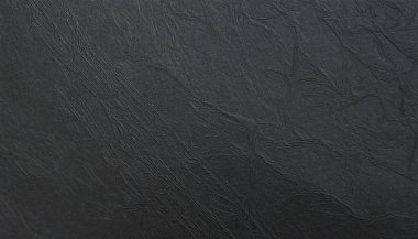 Matte siyah washi kağıdı köşegen açıyla hafifçe aydınlatılır, doğal fiber akışı ve inceliği vurgular. Huzur ve zarafeti birleştiren bir arkaplan dokusu..