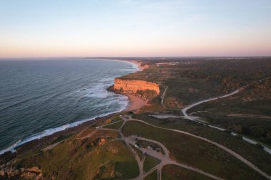 Aerial view of landscape with beautiful beach in Portugal. clipart