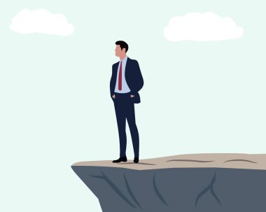 Takım elbiseli bir işadamı güvenle uçurumun kenarında duruyor risk almayı, karar vermeyi, liderliği sembolize ediyor ve iş dünyasındaki zorluklarla yüzleşiyor. İş kavramları, mali risk, kariyer büyümesi ve motivasyon için elverişli.