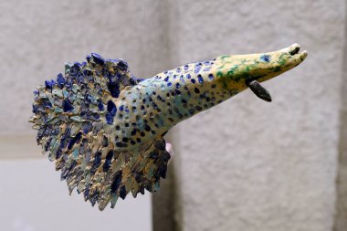 close up of a dragon in a market