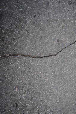 Çatlak asfalt dokusu arka planı, üst görünüm asfalt dokusu arka planı