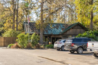 11/27/2024, Tampa, Florida, United States. The parking lot and entrance to the Eureka Springs Conservation Park, a County owned botanical garden in Hillsborough County, Tampa, Florida. clipart