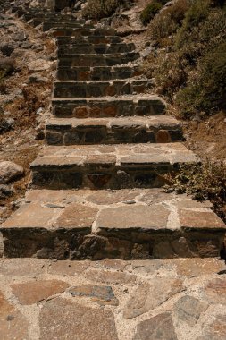 Stone stairs leading upwards from Kourtaliotiko Gorge waterfall hike clipart