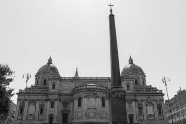 Rome, Italy- July 29, 2019: Obelisco Esquilino, an ancient obelisks located in Piazza dell'Esquilino  behind the apse of the Basilica of Santa Maria Maggiore in black and white clipart