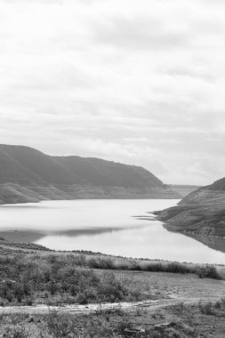 Lake Kouris nature landscape viewpoint near Alassa village, Cyprus in black and white
