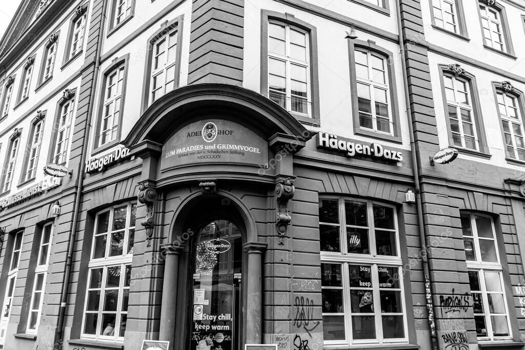 Frankfurt, Germany - April 18, 2025: Exterior of Hagen-Dazs ice cream parlor shop located in Frankfurts Old Town. A popular American ice cream brand in black and white