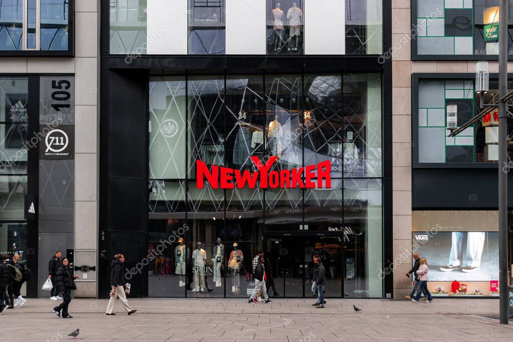 Frankfurt, Germany - April 18, 2025: Closed New Yorker fashion store across from MyZeil shopping mall in Frankfurt city center, with pedestrians passing by on street