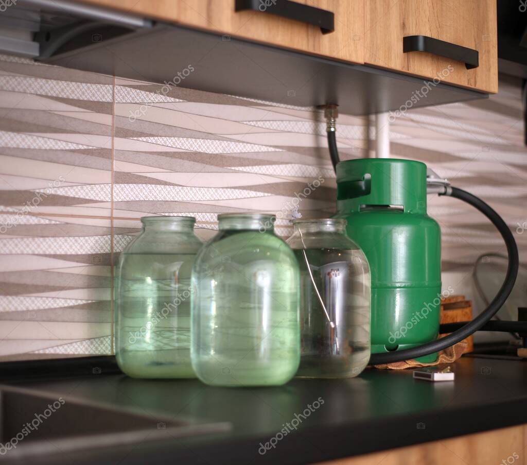 Mobile gas cylinder with burner for home use.