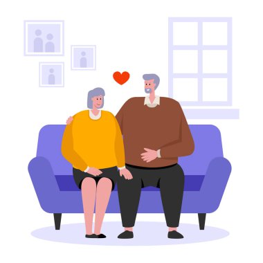 Mutlu yaşlı insanlar kanepede oturuyor..