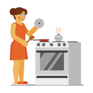 Mutfakta yemek pişiren kadın.