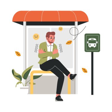 Genç adam otobüste cep telefonuyla oturuyor..