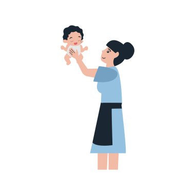 Kucağında bir bebek tutan bir kadın