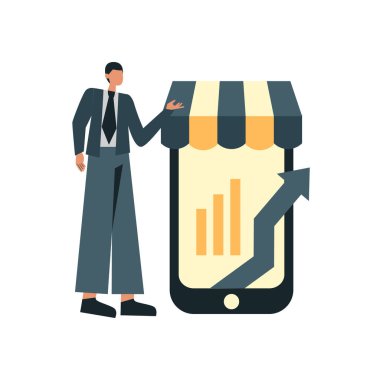 İş elbisesi giymiş bir adam telefonun yanında duruyor.