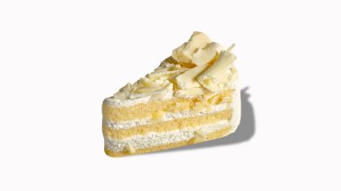 Beyaz arkaplanda vanilyalı beyaz çikolatalı kek. 