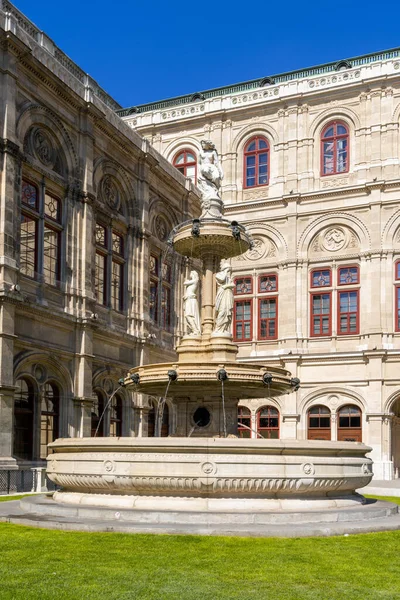 stock image Vienna, Austria - 22 September, 2022: historic fountain and statue by the Staatsoper opera house in downtown Vienna