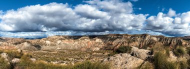 panorama landscape view of the Gorafe desert and red clay canyons in southern Spain