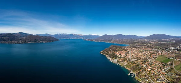 Drone landscape panorama of Lake Maggiore in the Italian Lake District and the village of Ispra