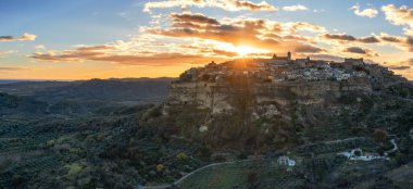 Santa Severina, Italy - 6 December, 2023: drone panorama view of the hilltop village of Santa Severina in Calabria at sunrise clipart