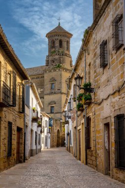 Baeza, Spain - 5 April, 2024: view of the historic old city centre of Baeza with the Baeza Cathedral in the background clipart