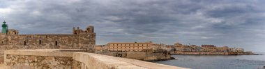 Syracuse, Italy - 28 December, 2023:panorama view of the Maniace Castle and Isola di Ortigia in Siracusa clipart